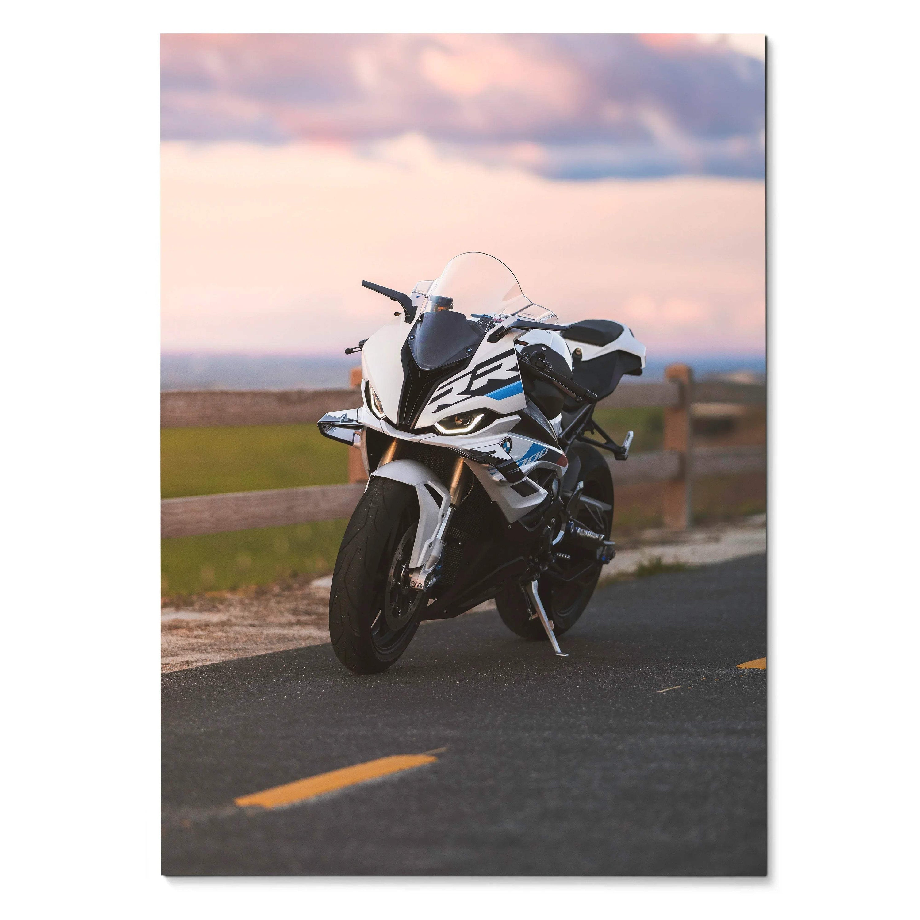 BMW S1000RR motorcycle poster with white and blue sportbike on road at sunset, premium wall art.