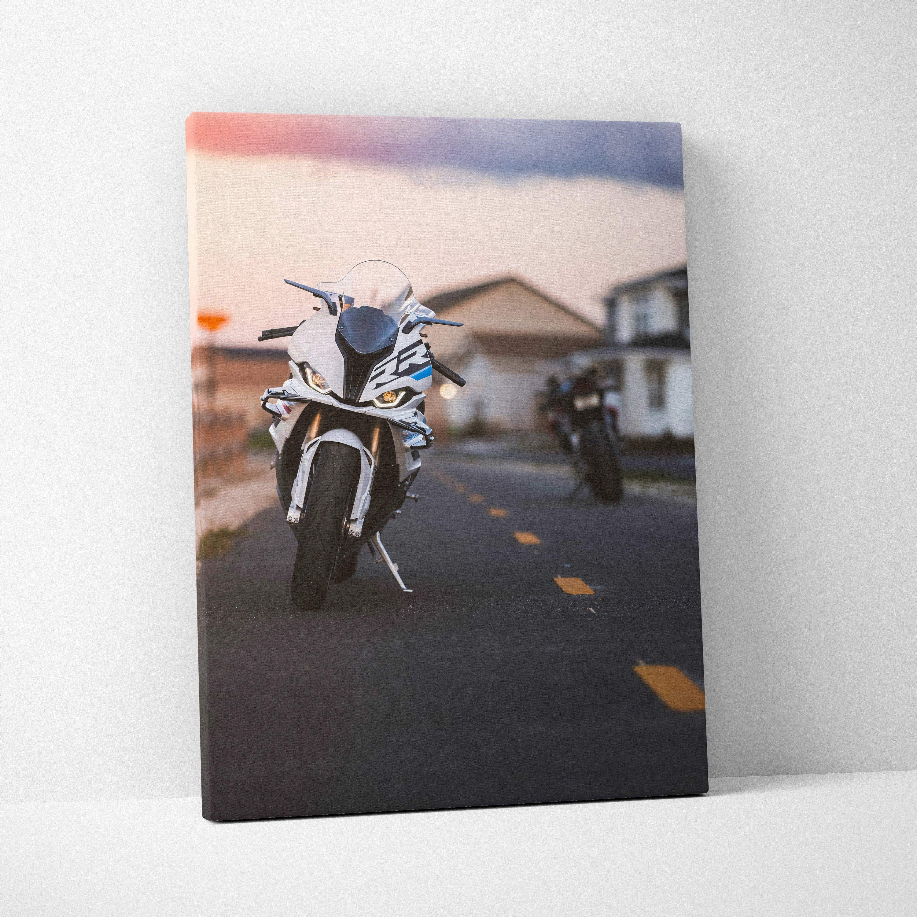 Vertical canvas art featuring a BMW S1000RR motorcycle on a road at sunset, high-resolution wall art.