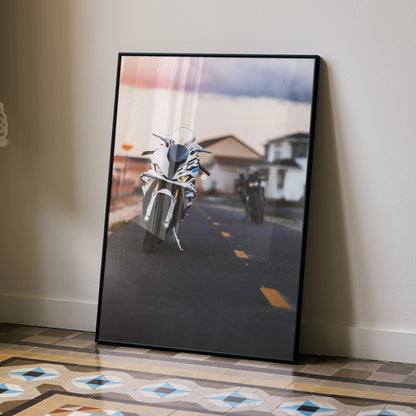 Motorbike wall art poster featuring BMW S1000RR and Aprilia RSV4 1100 on a road with blurred background.