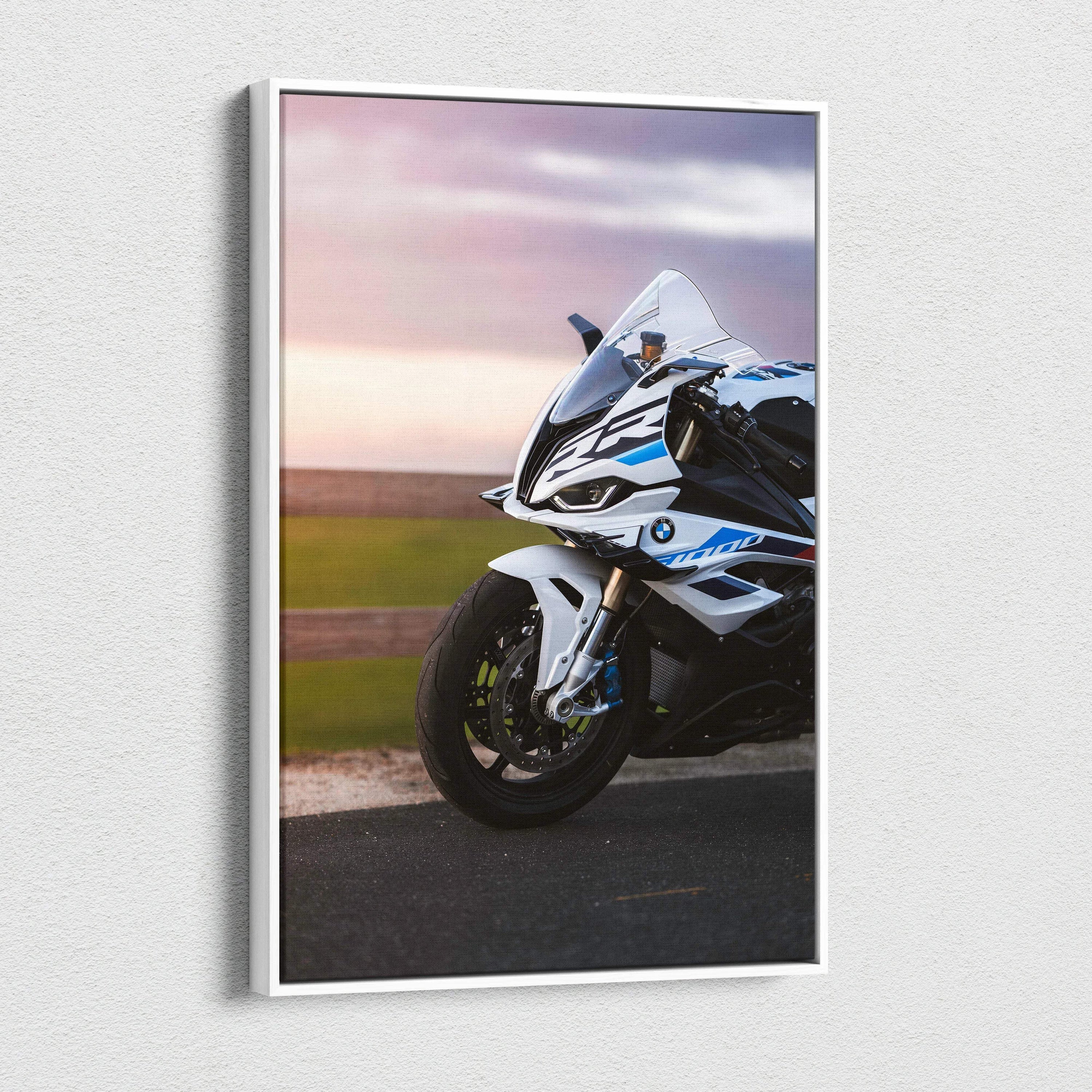 Vertical canvas wall art featuring a detailed BMW S1000RR motorcycle with sunset background.