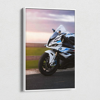 Vertical canvas wall art featuring a detailed BMW S1000RR motorcycle with sunset background.