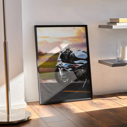 BMW S1000RR motorcycle poster wall art with dynamic sunset background in black frame.