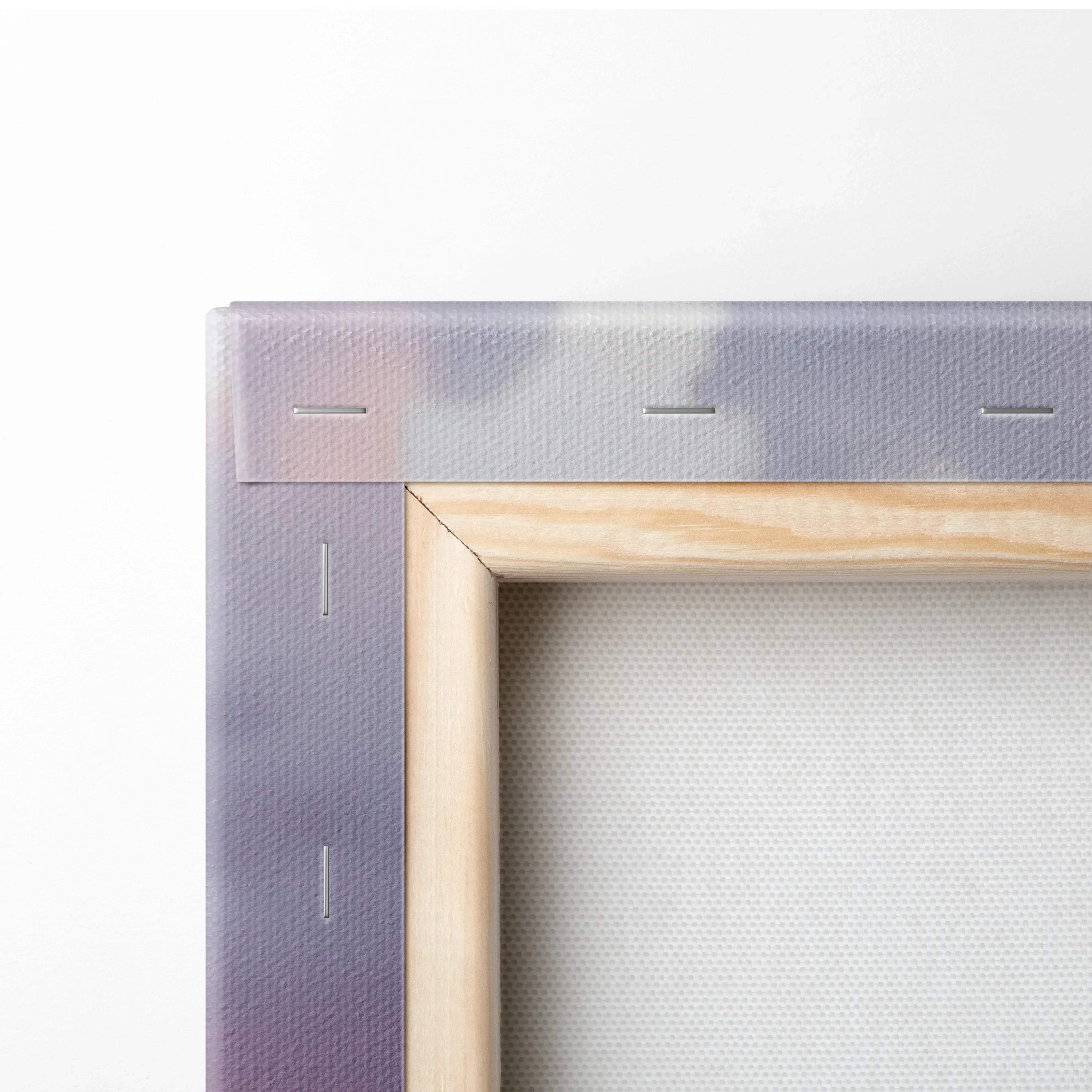 Close-up of wooden frame corner and stapled canvas for wall art print.