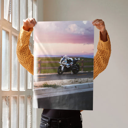 BMW S1000RR motorcycle poster wall art with sunset background on road at dusk.