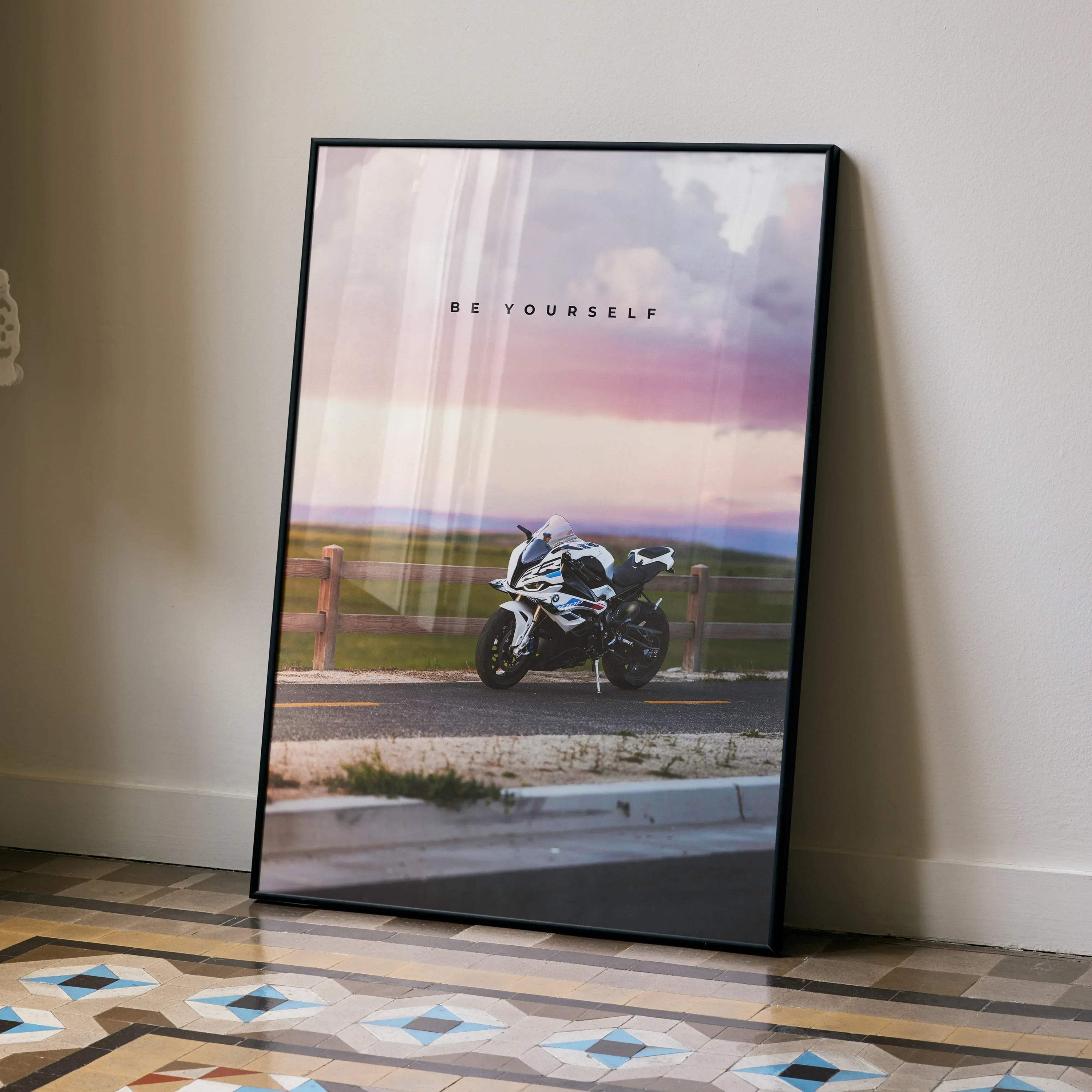 Motivational poster wall art featuring a BMW S1000RR motorcycle against a sunset landscape with "Be Yourself" text.