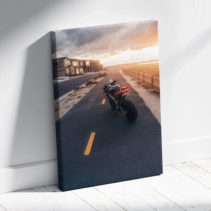 Vertical canvas wall art featuring Aprilia RSV4 1100 Factory motorcycle at sunset on coastal road.
