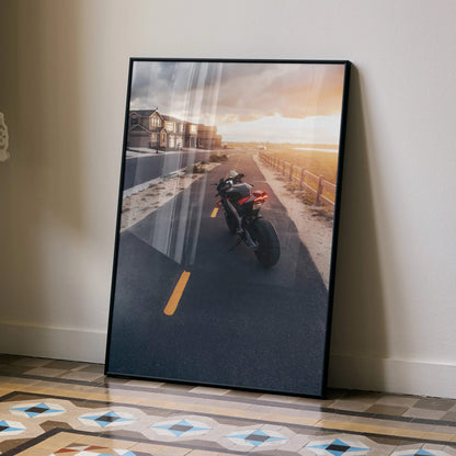 Aprilia RSV4 1100 Factory motorcycle poster with sunset road scene wall art in black frame.