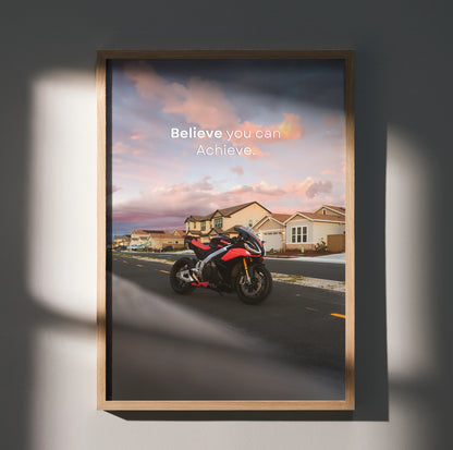 Motivational poster wall art featuring Aprilia RSV4 1100 Factory motorcycle with quote "Believe you can. Achieve.