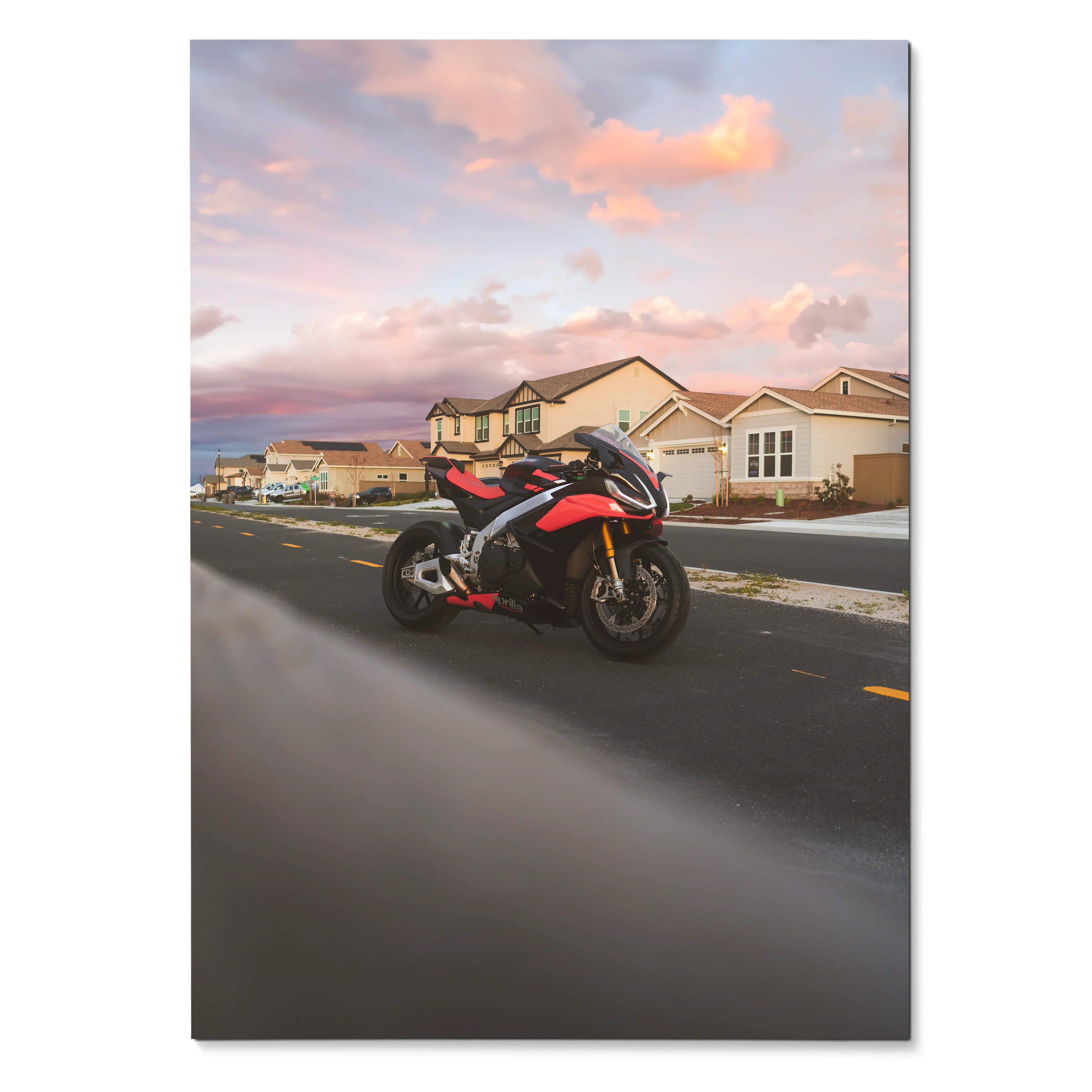 Aprilia RSV4 1100 Factory motorcycle parked on suburban street at sunset poster wall art.