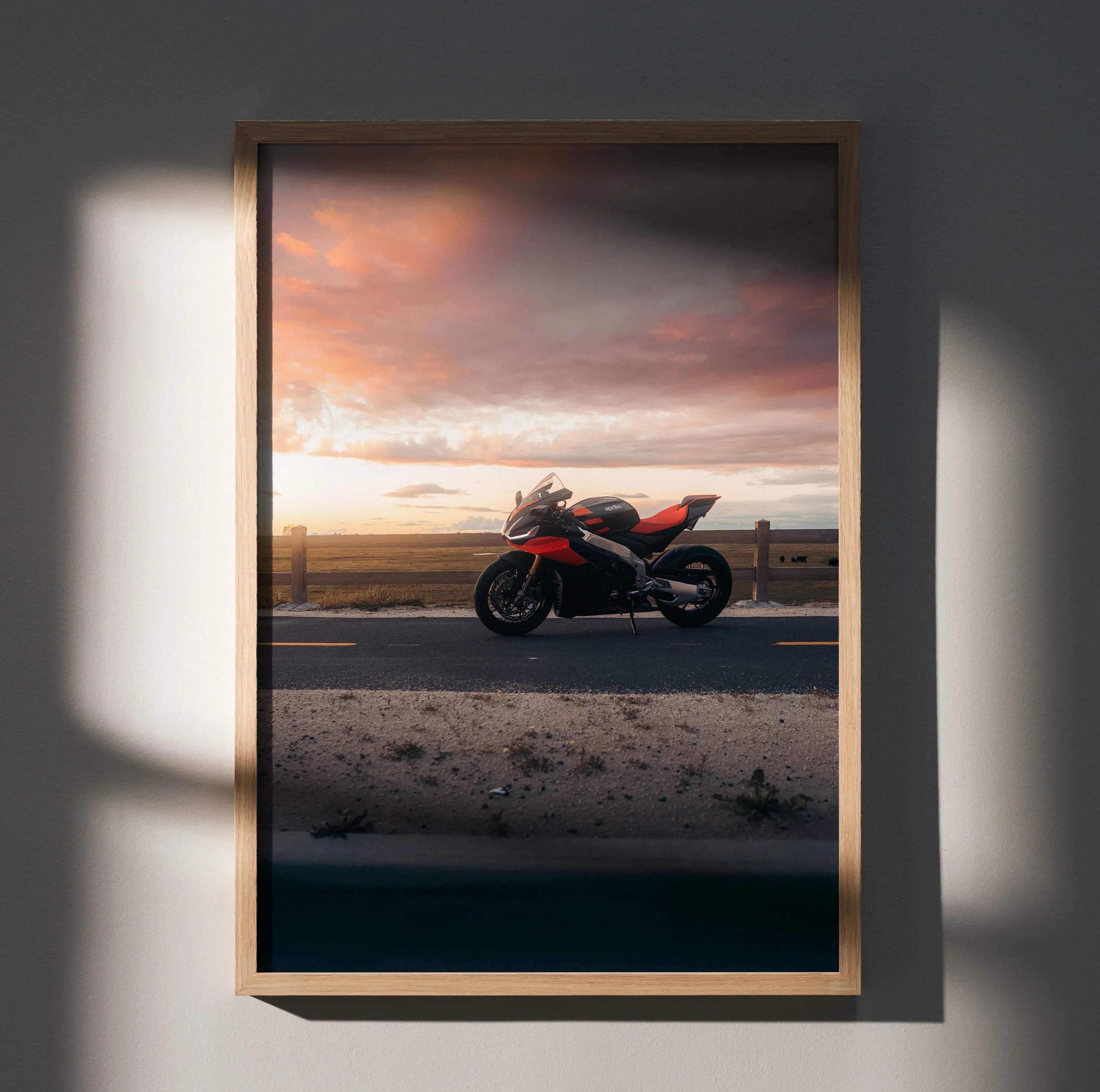 Aprilia RSV4 1100 Factory motorcycle poster with sunset backdrop, stylish wall art in wooden frame.