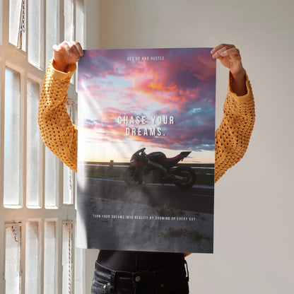 Motivational poster wall art with Aprilia RSV4 1100 Factory bike silhouette against a colorful sunset sky.