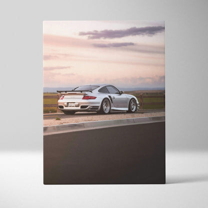 Porsche 911 Turbo at sunset on canvas wall art with sleek white sports car and scenic sky.