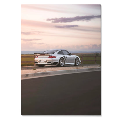 Porsche 911 Turbo sports car on runway at sunset luxury automotive poster wall art.