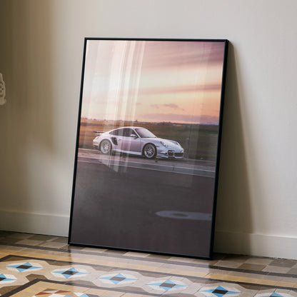 Porsche 911 Turbo poster with sunset backdrop wall art in sleek black frame.