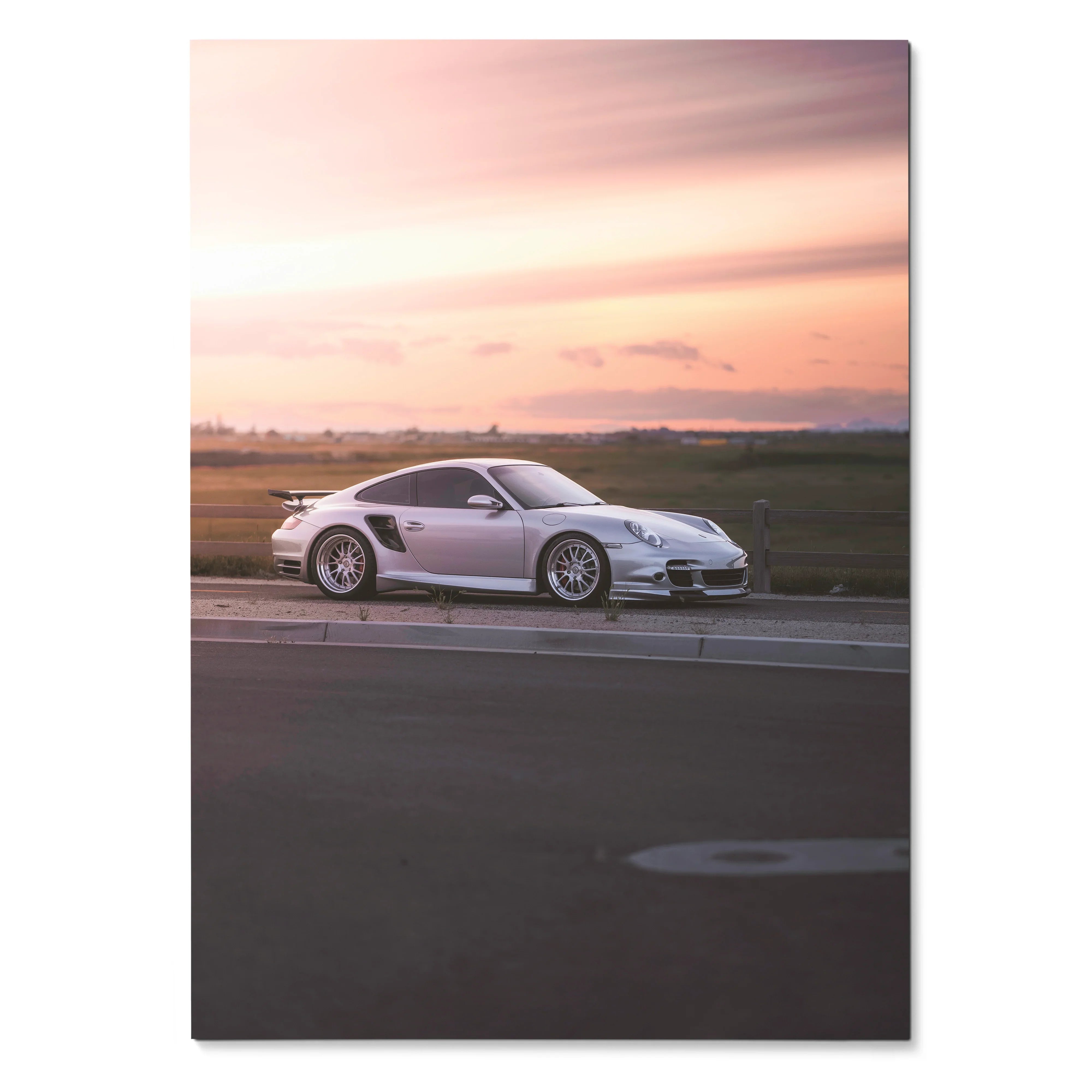Porsche 911 Turbo in white parked on road at sunset with soft pink sky poster wall art.