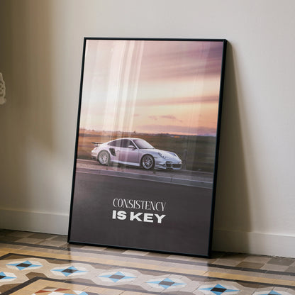 Porsche 911 Turbo on road motivational poster with "Consistency is Key" text wall art.