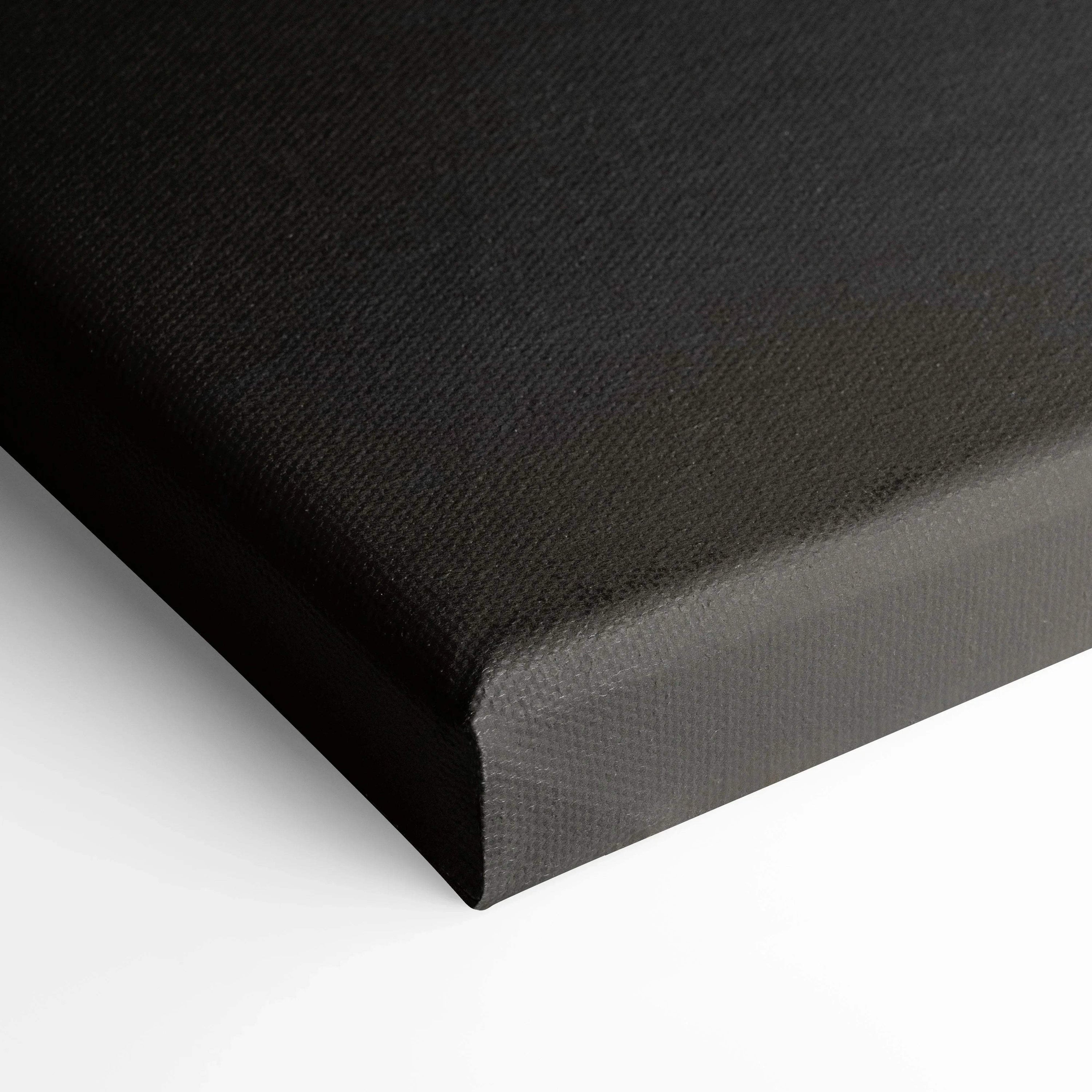 Black gallery-wrapped canvas with textured surface for wall art and canvas art display.