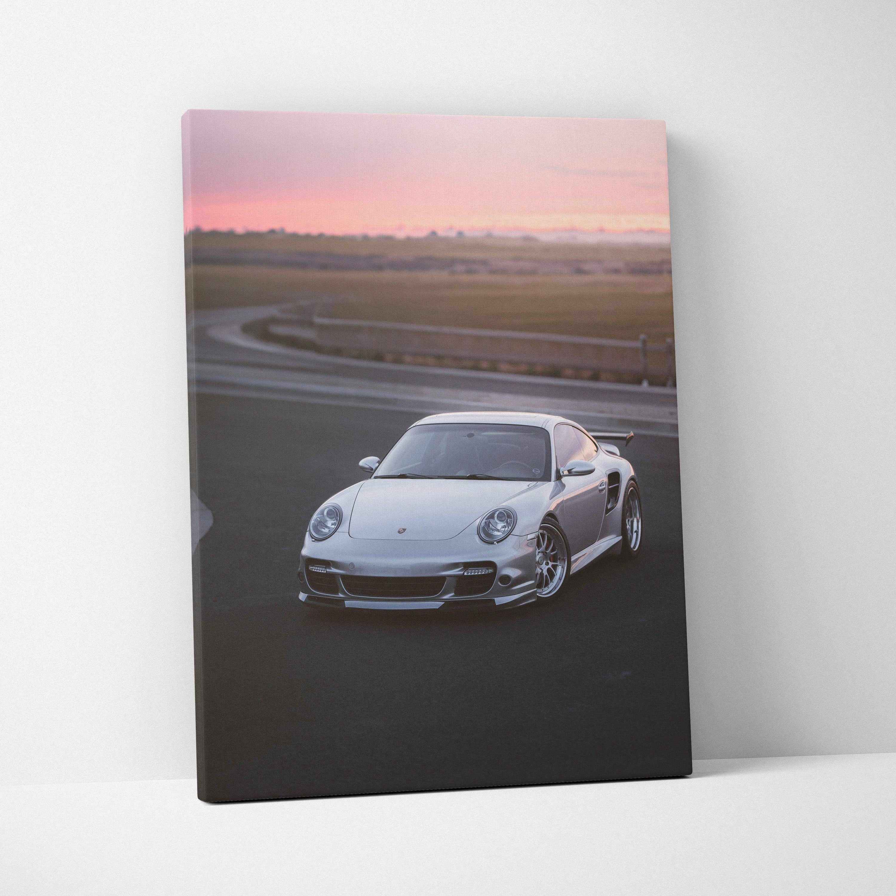 Porsche 911 Turbo on racetrack at sunset canvas wall art, vertical canvas print.