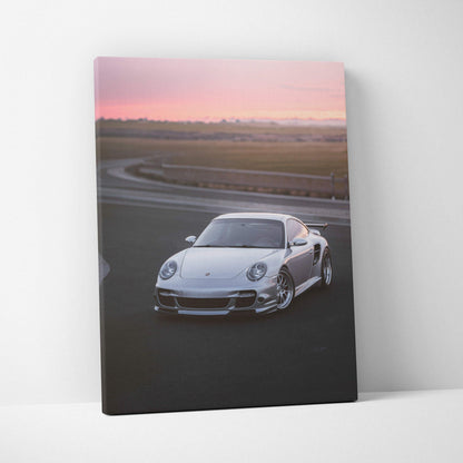 Porsche 911 Turbo on racetrack at sunset canvas wall art, vertical canvas print.