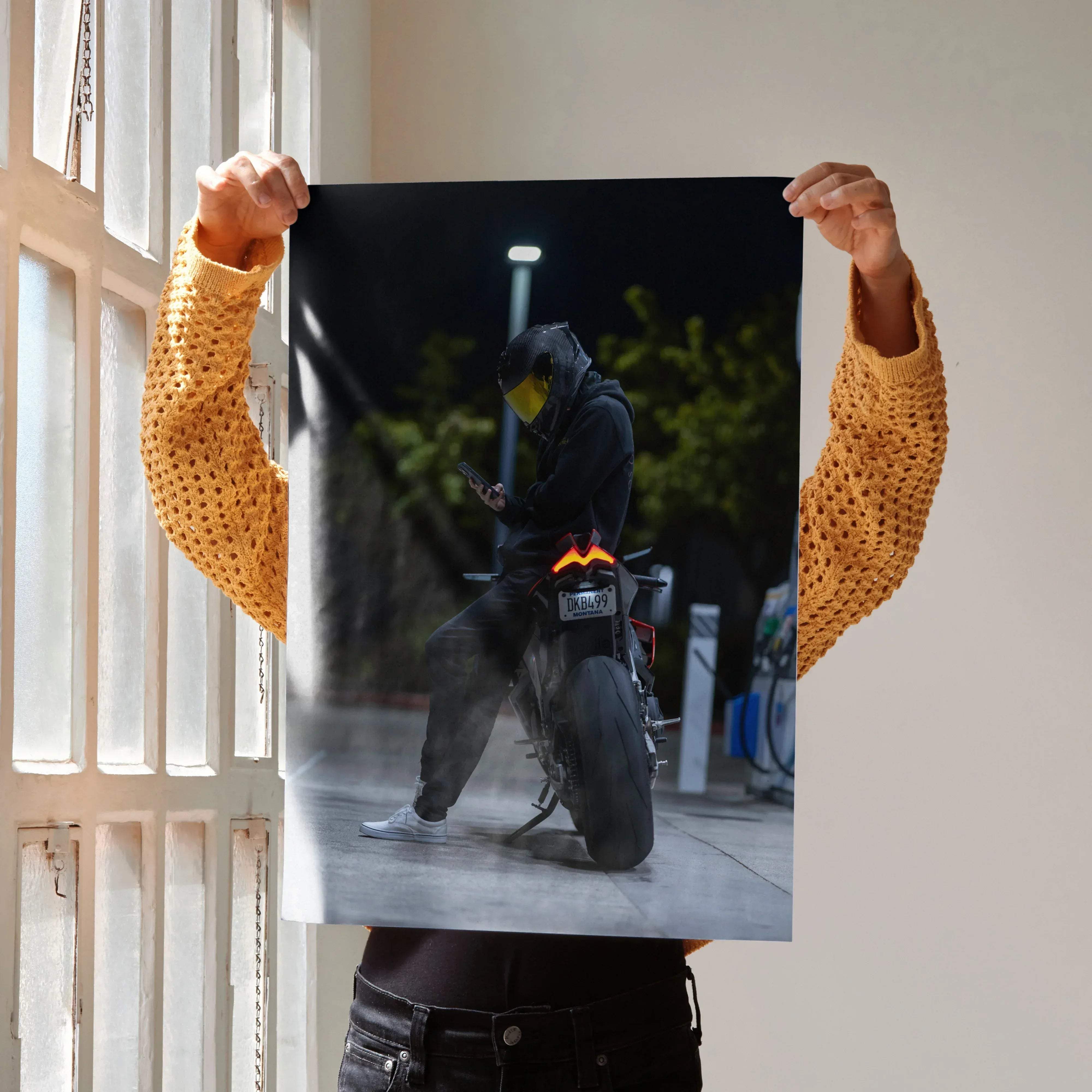 Black motorcycle poster biker poster 013 with rider in full gear glowing yellow visor and red taillight on torso display