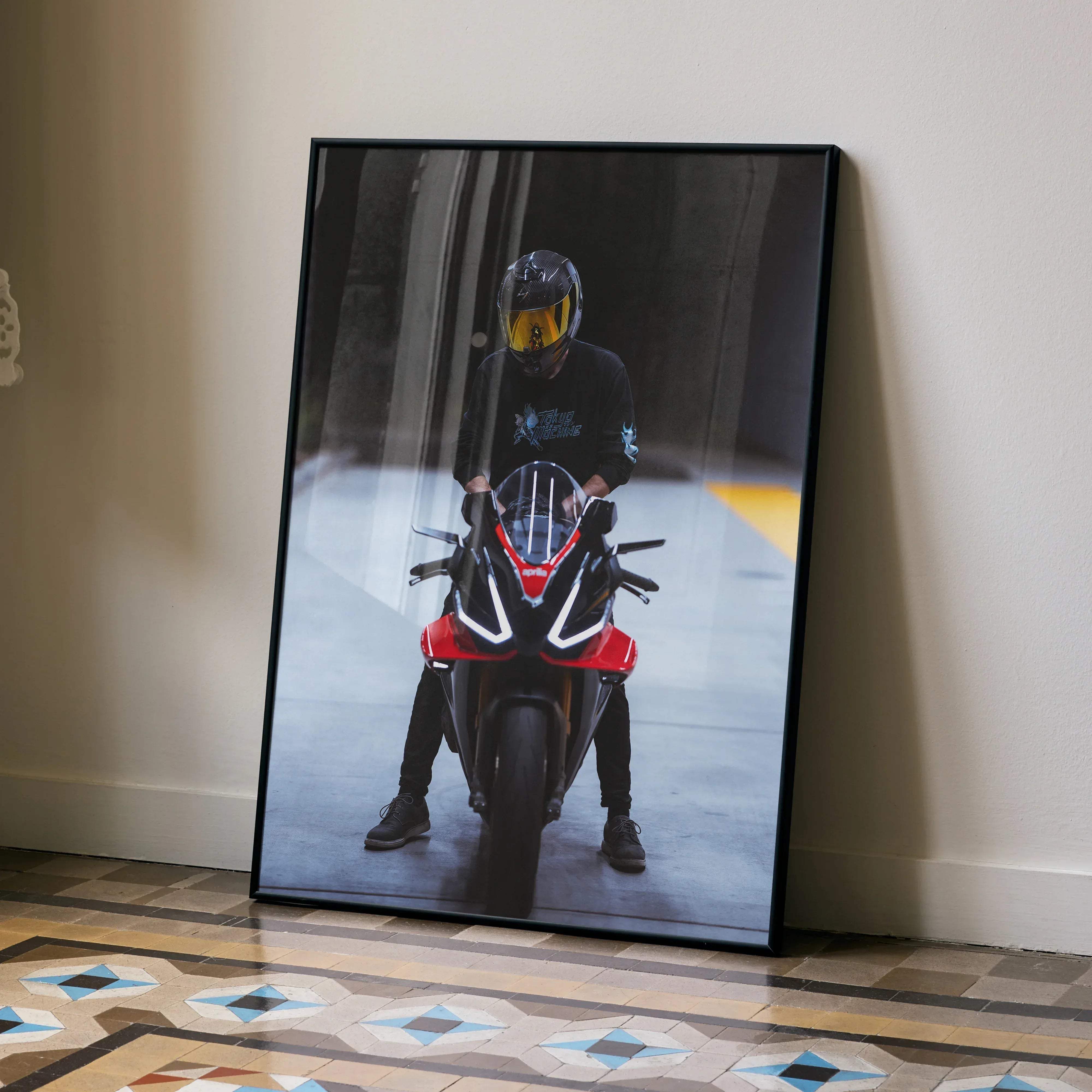 Black-framed canvas print of a red and black aprilia rsv4 motorcycle with rider wearing scorpion r1 helmet biker poster