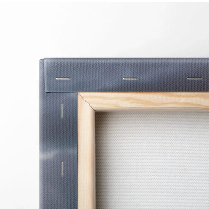 Close-up of wooden stretcher bars and canvas fabric edge on vertical wall art canvas print.