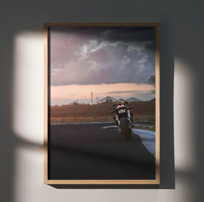 Aprilia RSV4 1100 Factory motorcycle poster with sunset background, premium wall art in wooden frame.