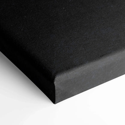 Black wrapped edge canvas wall art with textured surface and clean corners.