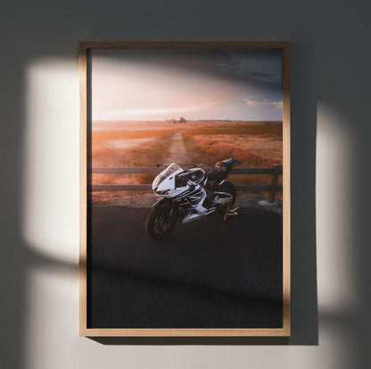 Honda CBR600RR motorcycle poster wall art featuring a sleek bike against a sunset landscape.