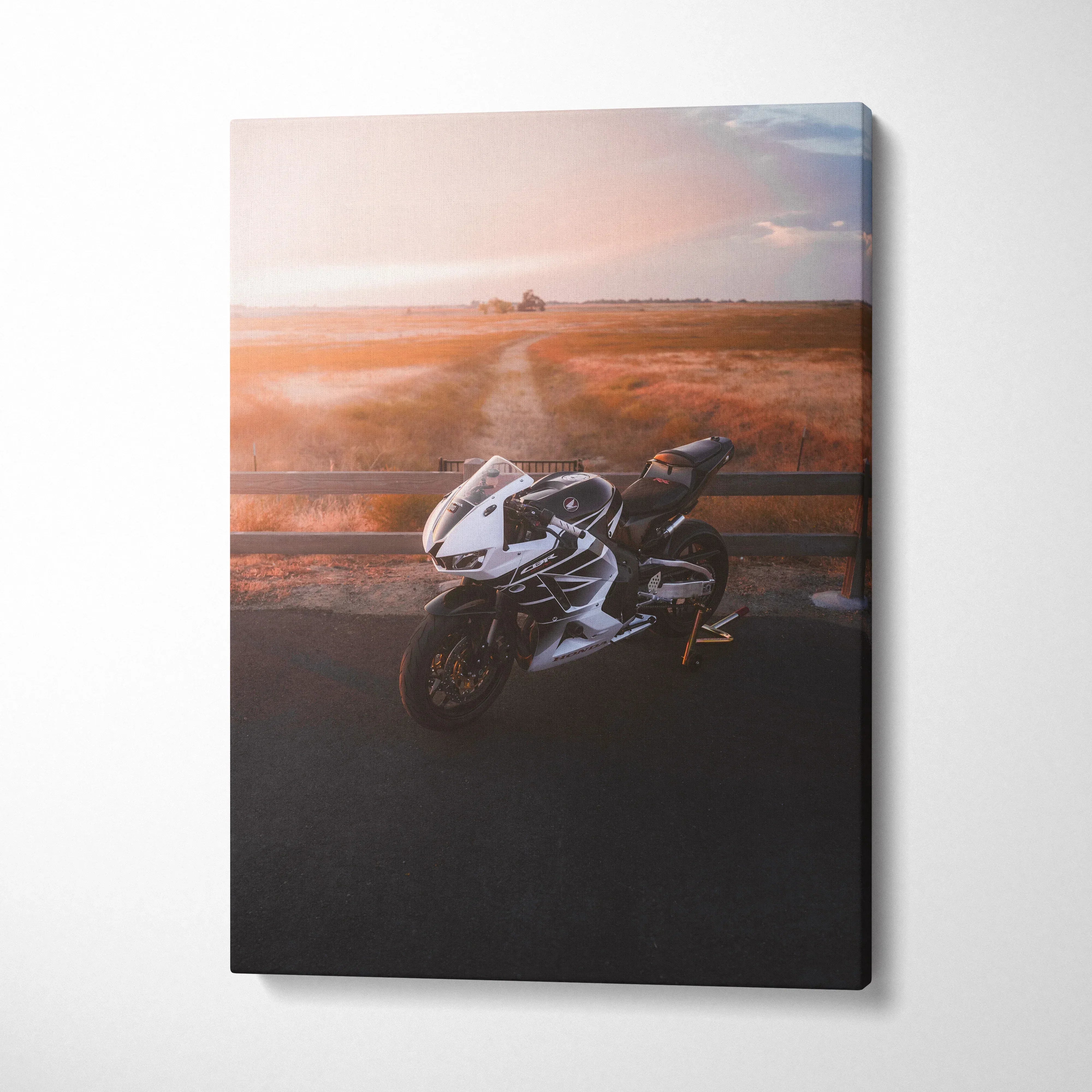 Honda CBR600RR motorcycle captured in sunset scene on vertical canvas wall art.