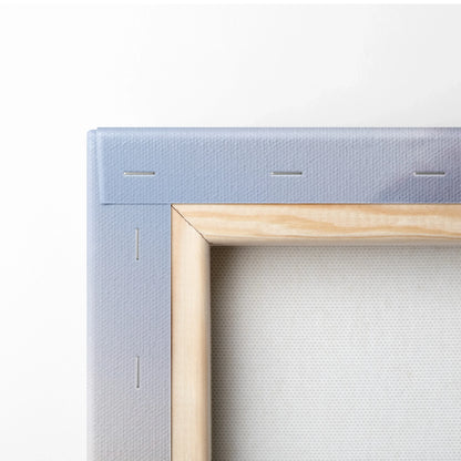 Close-up of wooden frame and canvas back with staples for vertical wall art print.