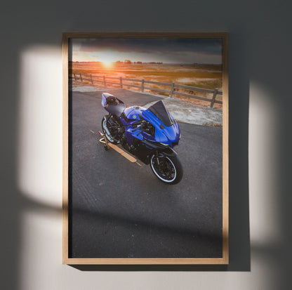 Yamaha R1 motorcycle poster with blue bike at sunset on road, framed wall art.