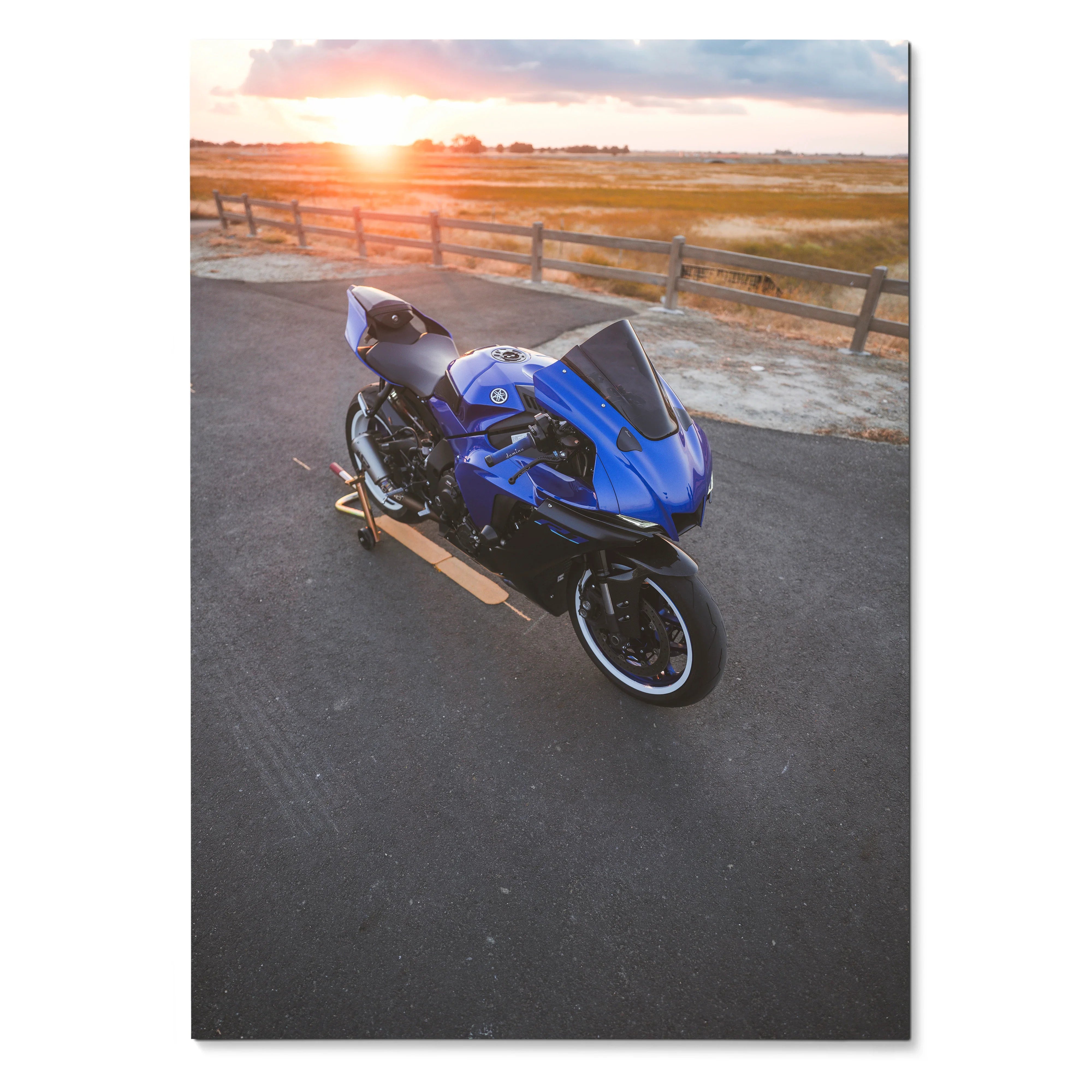 Blue Yamaha R1 motorcycle on road at sunset poster wall art.