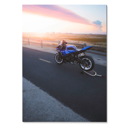 YZF-R1 Yamaha motorcycle parked on road at sunset poster wall art with pink sky.
