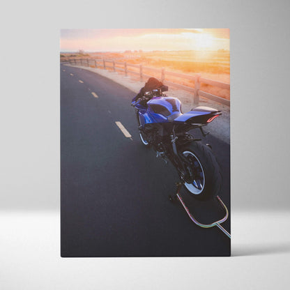 Blue Yamaha R1 motorcycle on coastal road at sunset canvas wall art print.
