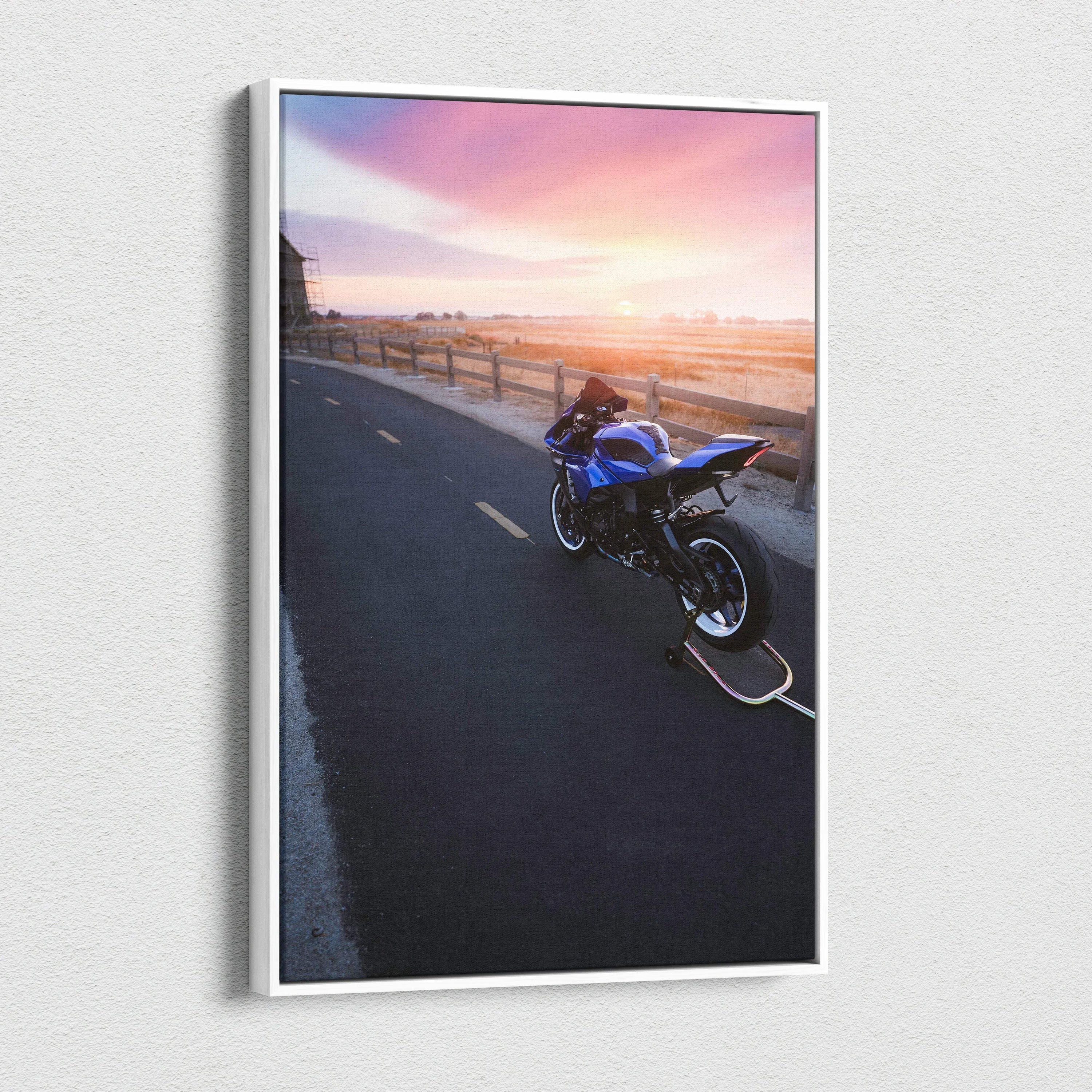 Yamaha R1 motorcycle on coastal road at sunset on vertical canvas wall art.