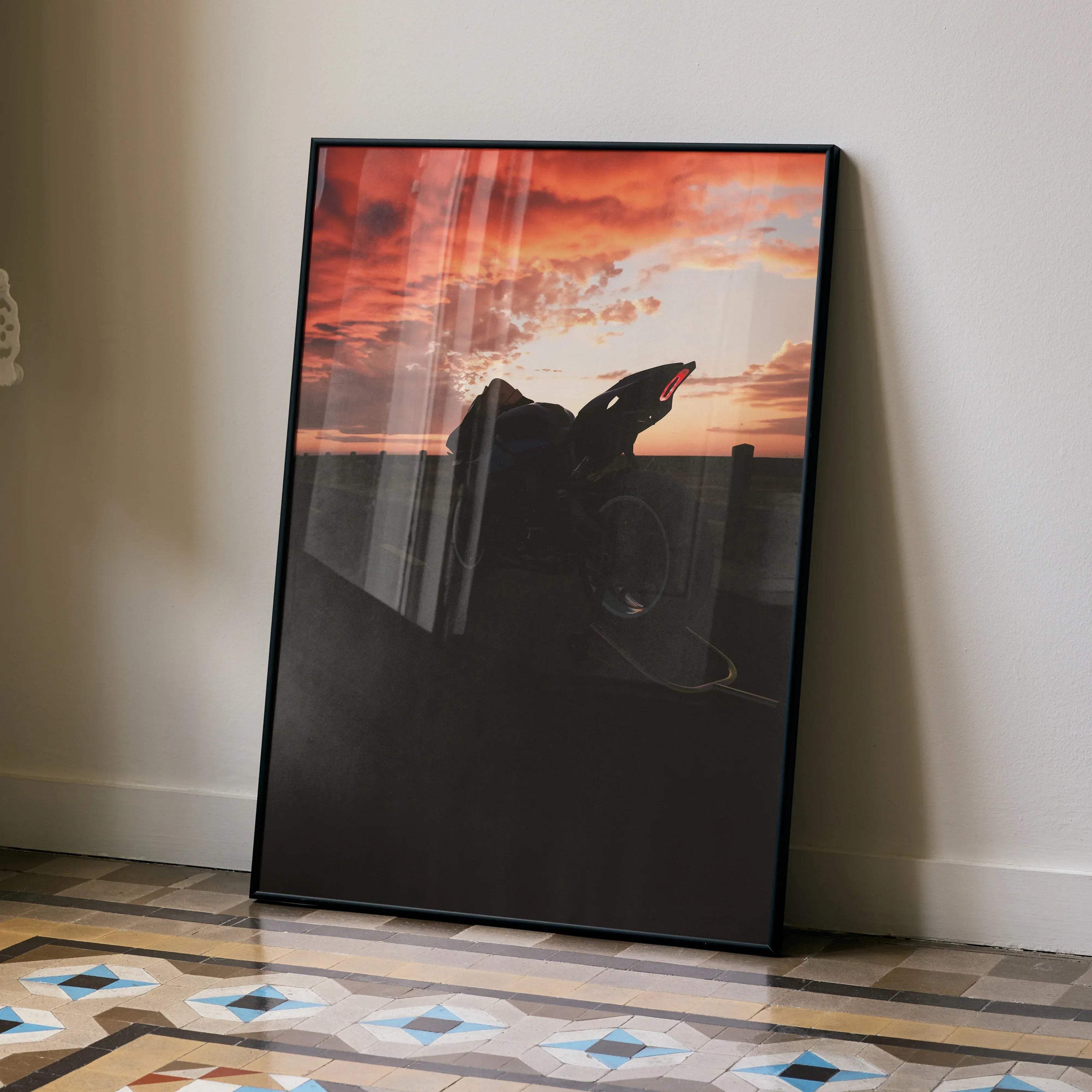 Yamaha R1 motorcycle silhouette against vibrant sunset sky poster wall art in black frame.