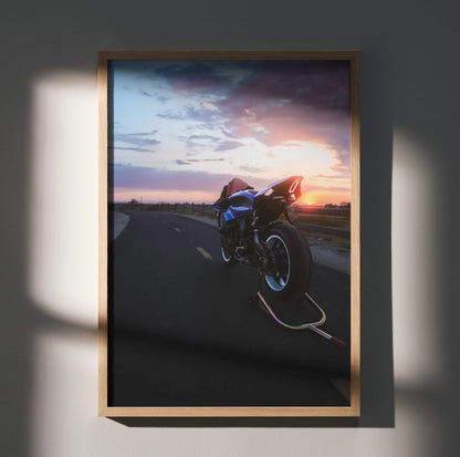 Yamaha YZF-R1 motorcycle at sunset on road poster wall art in wooden frame.
