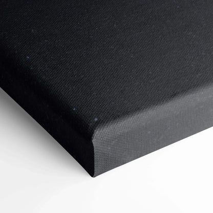 Black stretched canvas corner detail highlighting texture and material of vertical wall art canvas print.