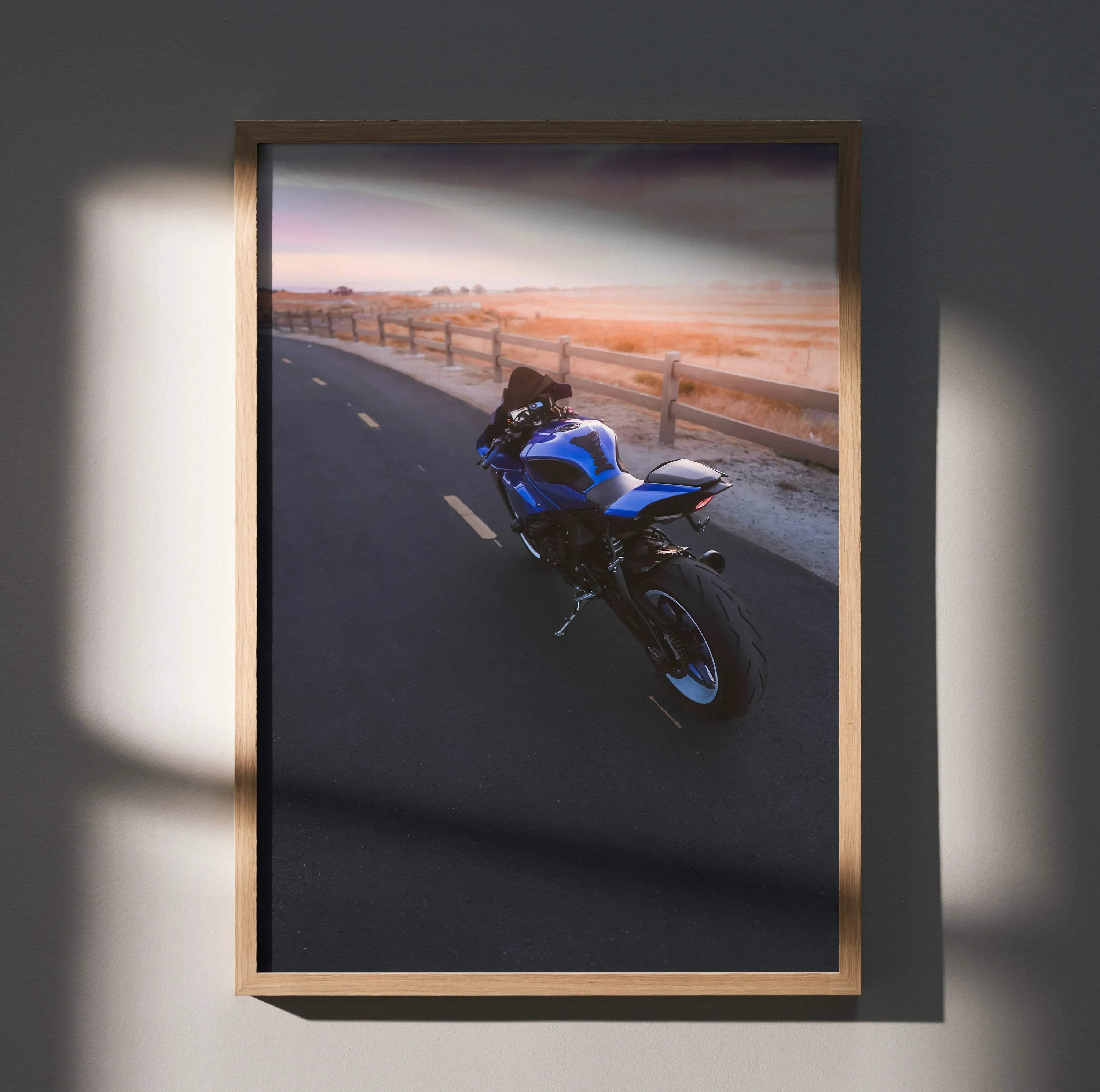 Yamaha YZF-R1 motorcycle riding on road at sunset poster wall art in wooden frame.
