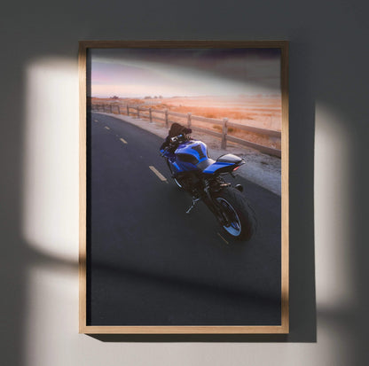 Yamaha YZF-R1 motorcycle riding on road at sunset poster wall art in wooden frame.