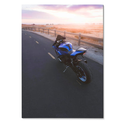 Blue Yamaha YZF-R1 motorcycle parked on road at sunset poster wall art.