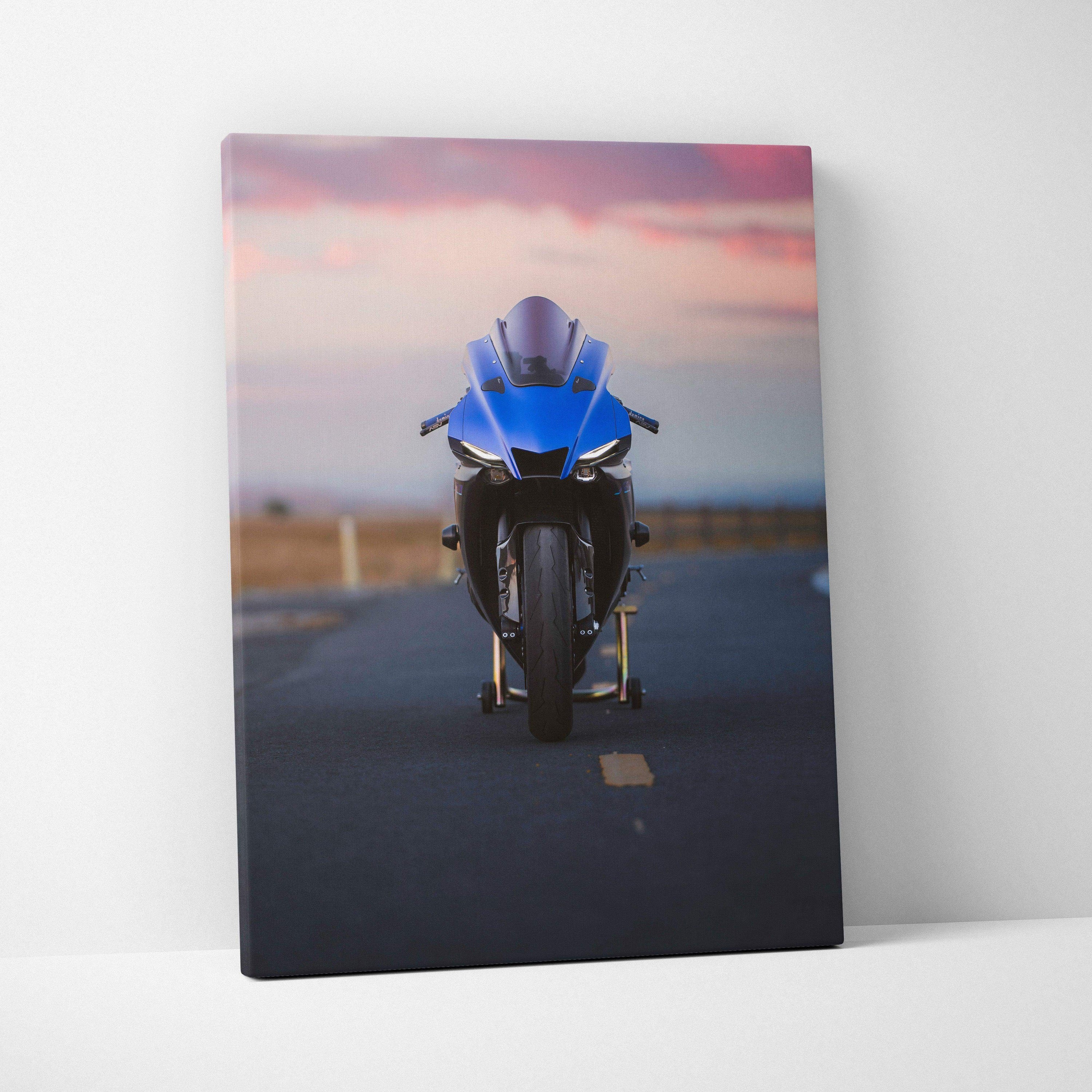 Yamaha R1 motorcycle front view on road at sunset canvas wall art with vibrant colors.