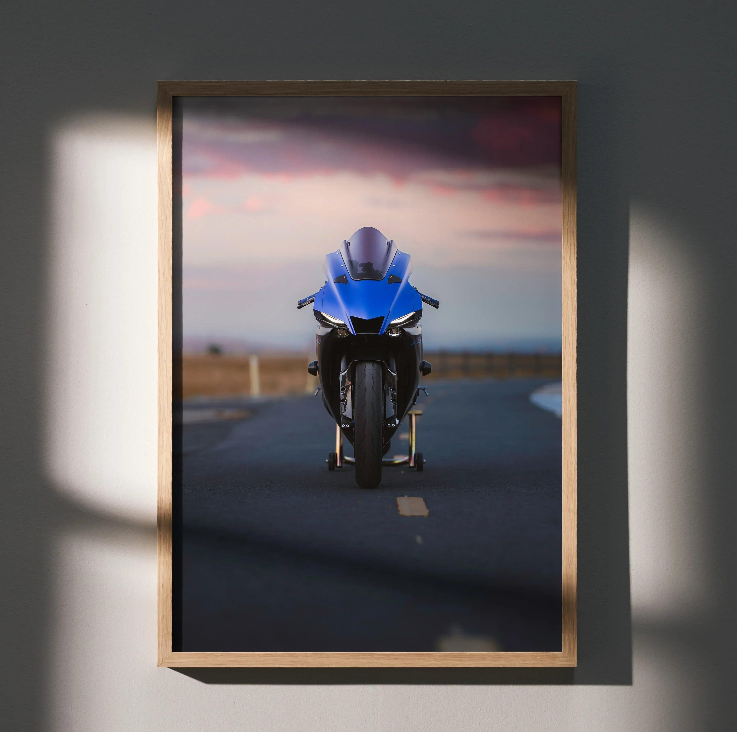Blue Yamaha YZF-R1 motorcycle poster with sunset road background, modern wall art.