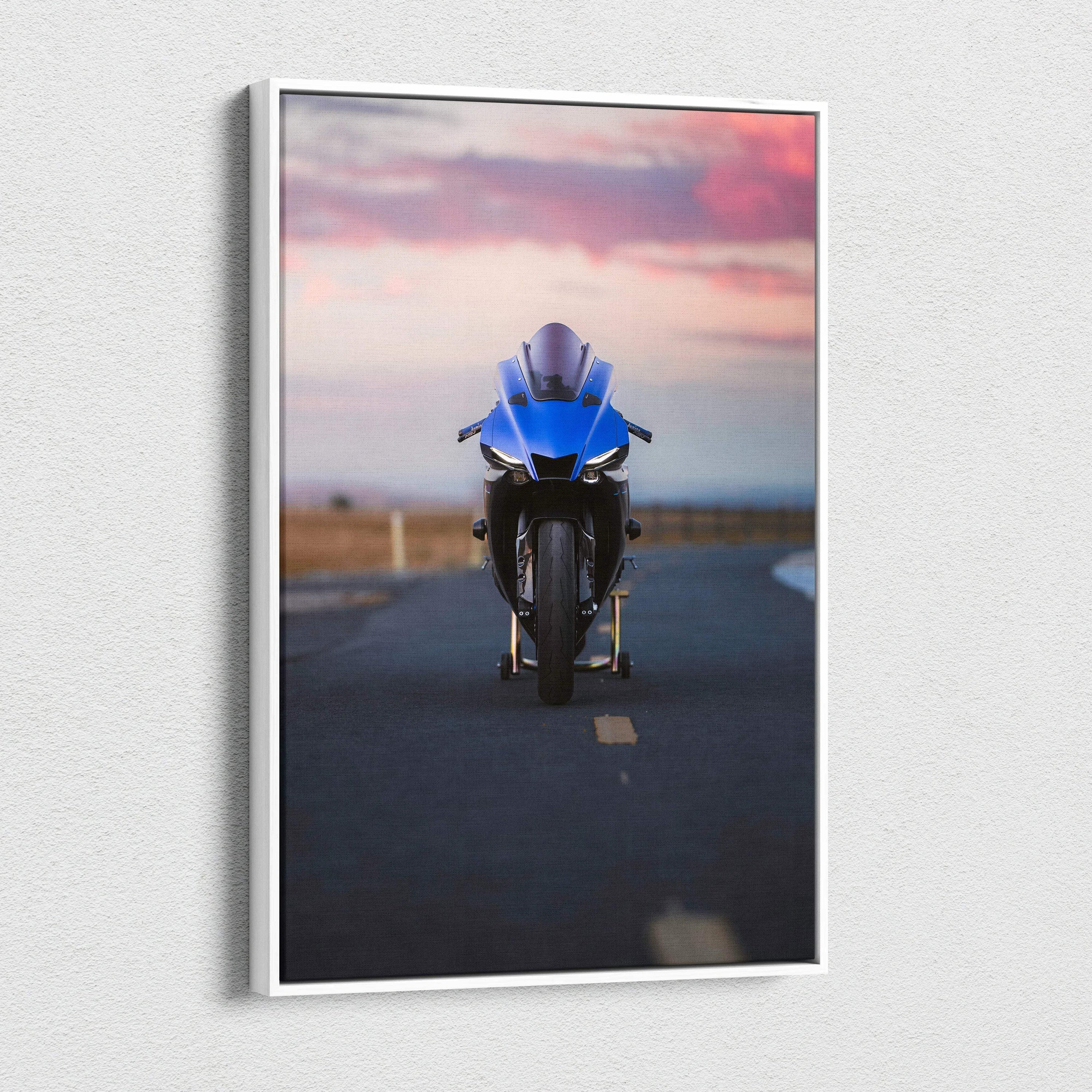 Blue Yamaha R1 motorcycle on road at sunset vertical canvas wall art print.