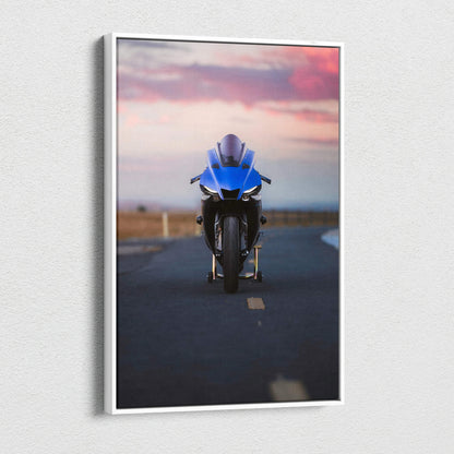 Blue Yamaha R1 motorcycle on road at sunset vertical canvas wall art print.