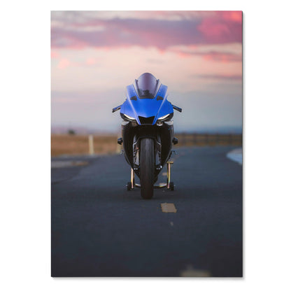 Blue Yamaha YZF-R1 motorcycle on road at sunset Poster Wall Art.