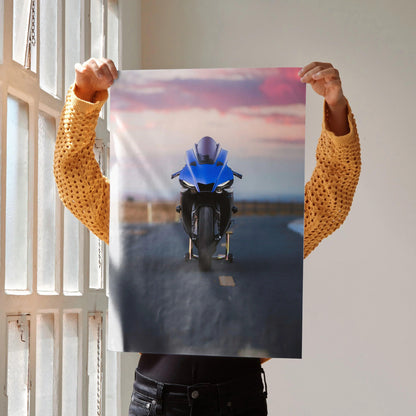 YZF-R1 motorcycle poster with blue bike facing forward on open road at sunset, stylish wall art.