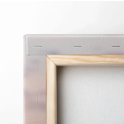 Close-up of wooden frame and white canvas texture showcasing quality canvas art wall art materials.