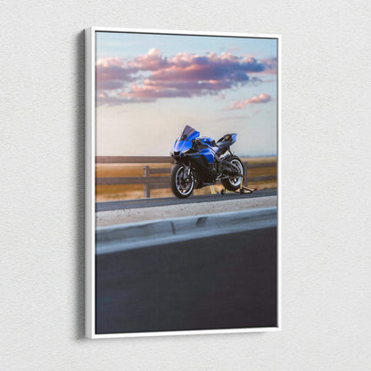 Yamaha R1 blue motorcycle on highway under cloudy sky canvas art wall art.